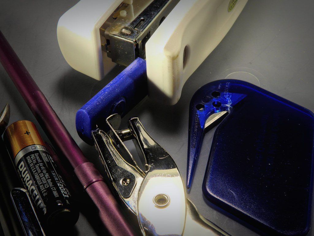 Office Knick Knacks a close up of an assortment of office … Flickr