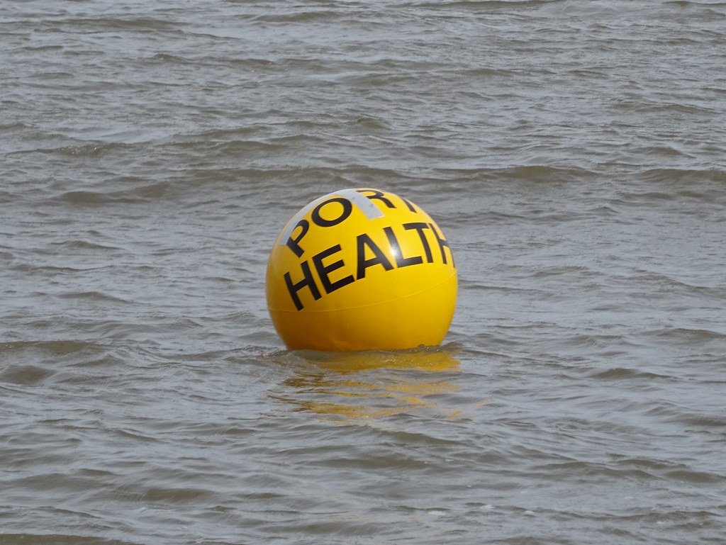 A yellow buoy marking the location of a quarantine anchora… Flickr