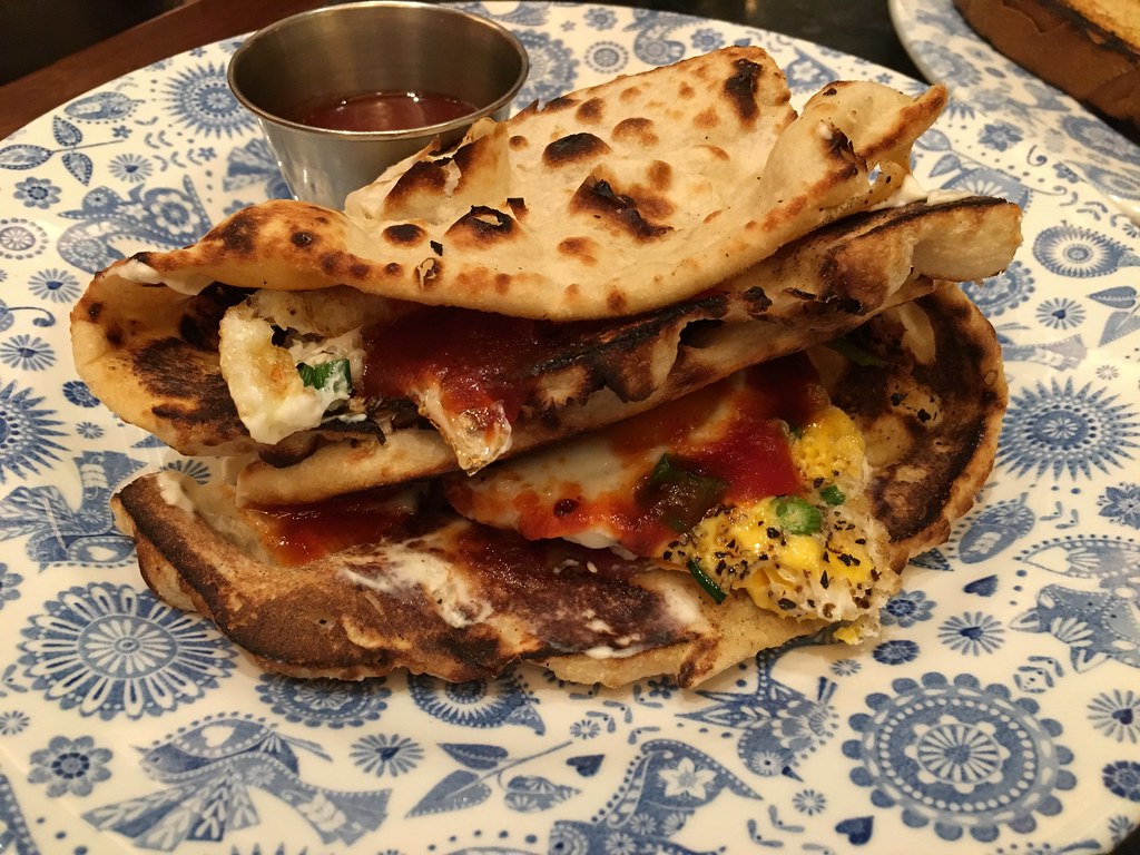 Dishoom Bacon and egg naan roll with tomato jam Deborah and Thomas