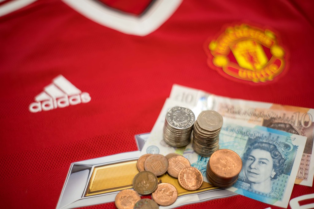 The Cost of Football Shirts The image shows bank notes alo… Flickr