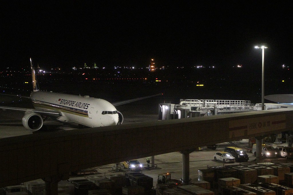 Singapore Airlines jet is pushed back from the gate while … Flickr