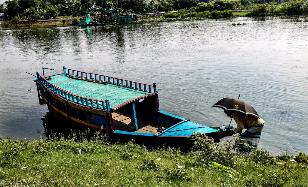 A boat rider with his boat chandralekha biswas Flickr