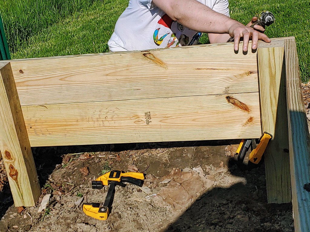 Building the raised bed inplace (18' is too heavy to move… Flickr
