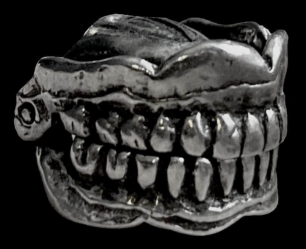 Choppers...Sterling dentures for charm bracelet. GArY Flickr