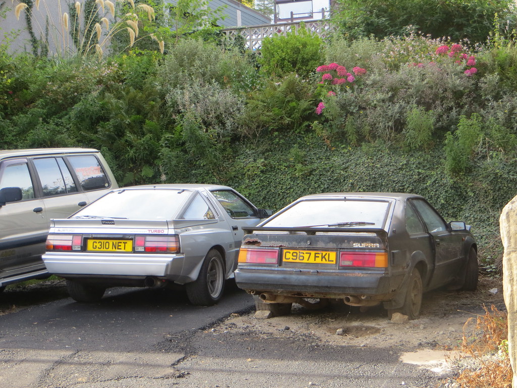 1986 Toyota Celica Supra and 1990 Mitsubishi Starion Turbo… Flickr