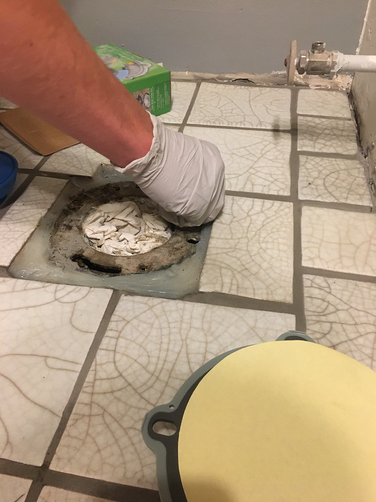 Silicon around the toilet fixture With a closeup of the n… Flickr