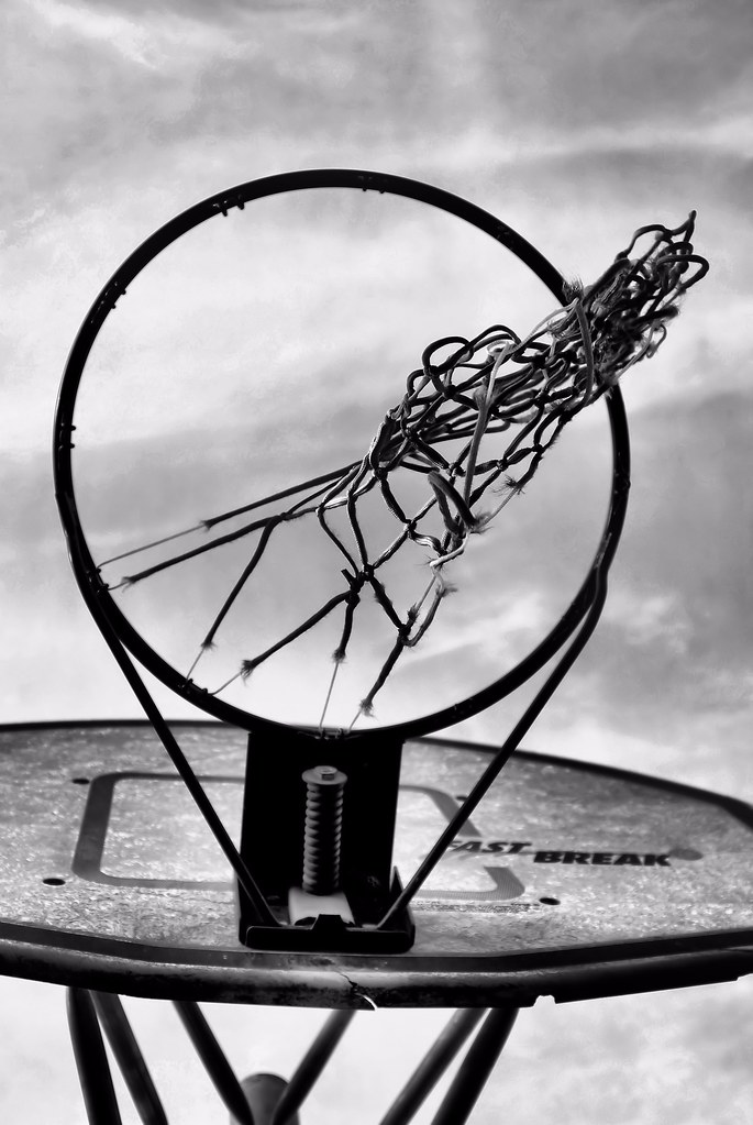 Hoop Dreams Old basketball hoop with ratty net. Bob Wall Flickr