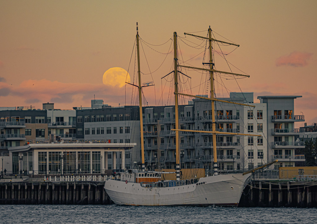 Moon rising behind Pier 1, East Boston I think some people… Flickr