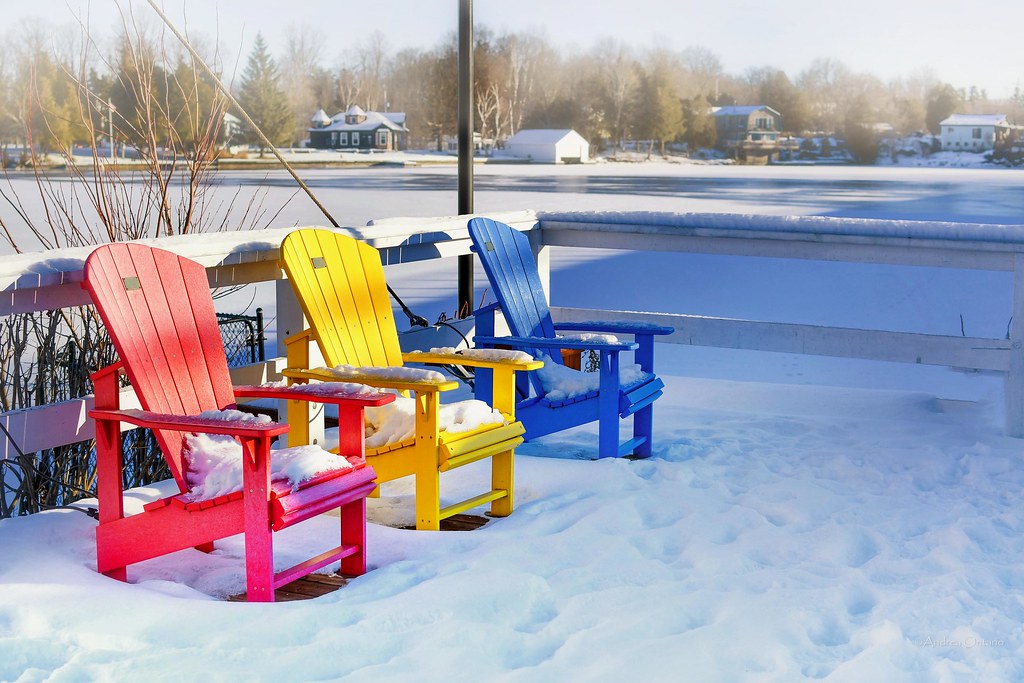 Colourful Muskoka chairs in the snow Andrea Ontario Flickr