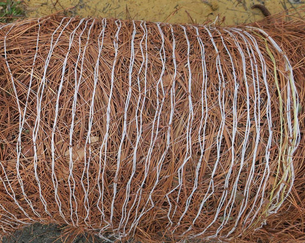 Bale of pine needles for mulch in the garden All rights re… Flickr