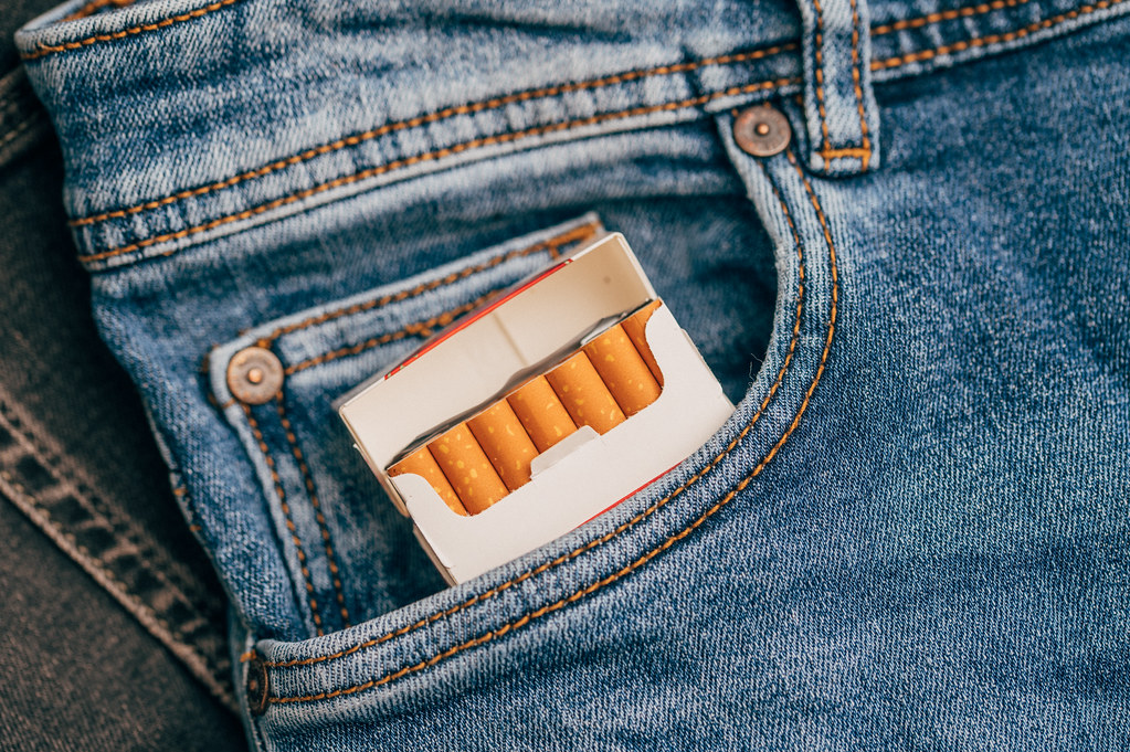 Closeup of a pack of cigarettes in a pocket of blue jeans… Flickr