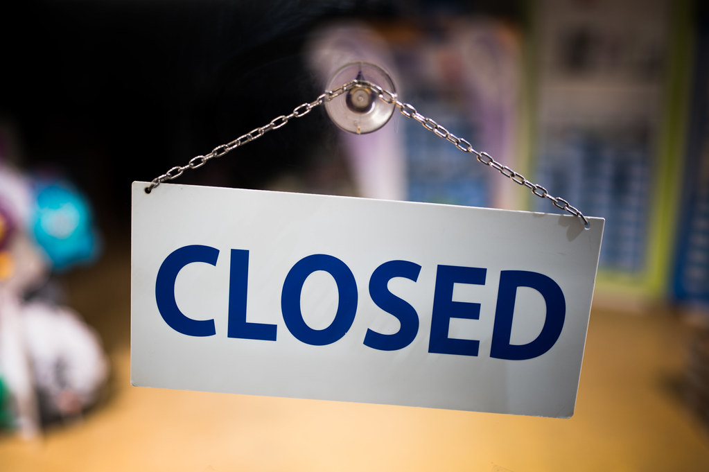 Closeup of "closed" sign on a store door. Store closed du… Flickr