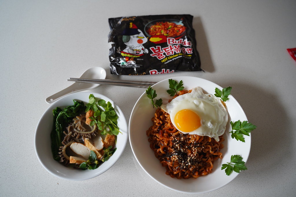 Samyang Buldak spicy noodles with fried egg, tripe, fish c… Flickr