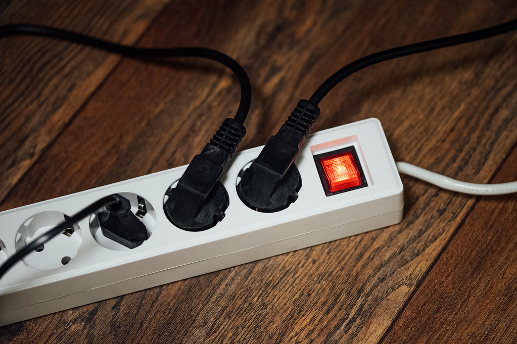Closeup of an extension cord on the floor with several po… Flickr