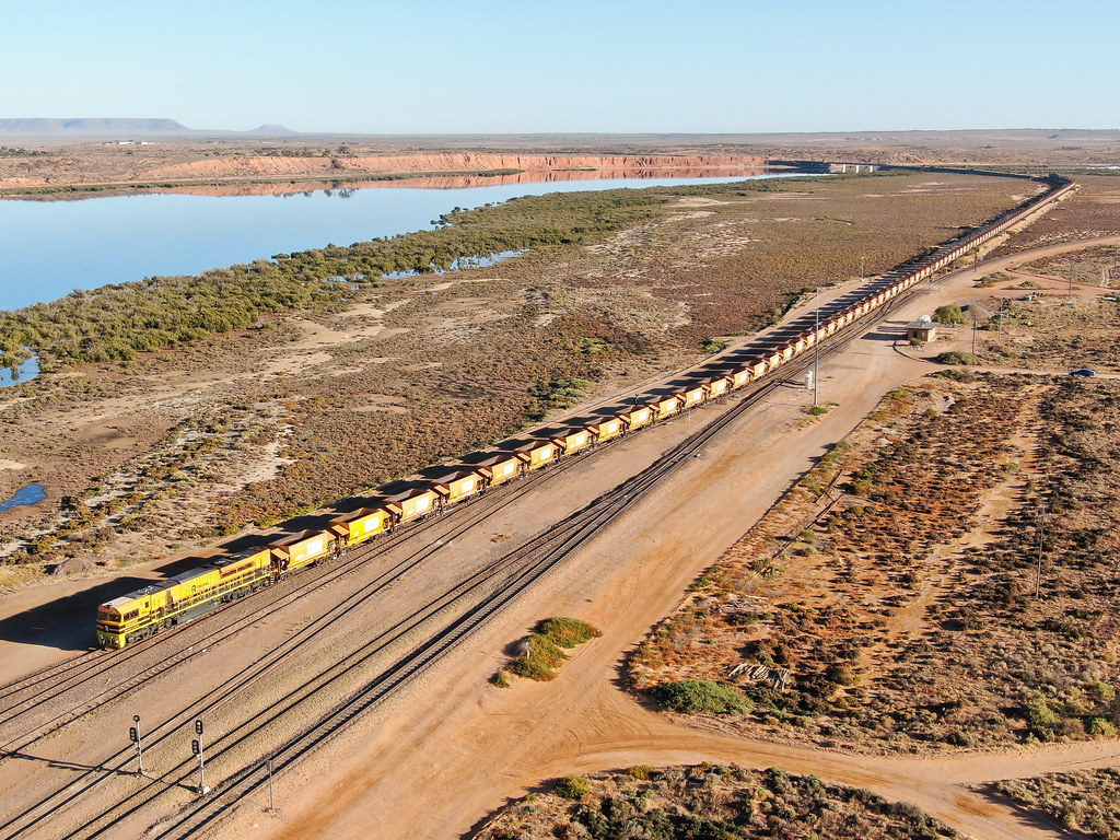 Spencer Junction GWA002 leads 6911 empty ore train coming … Flickr
