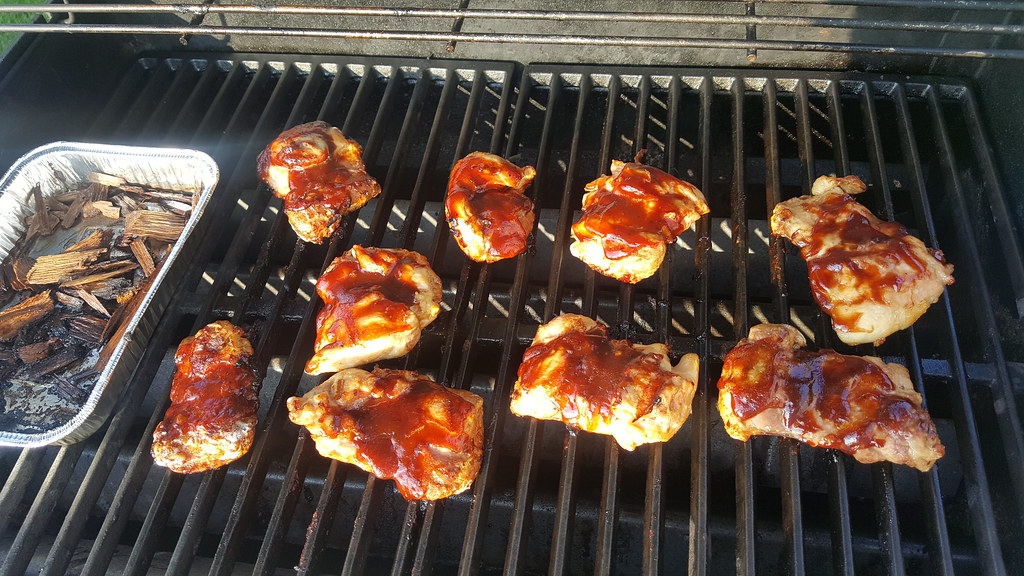 Smoked barbecued chicken thighs Grilling chicken thighs on… Flickr