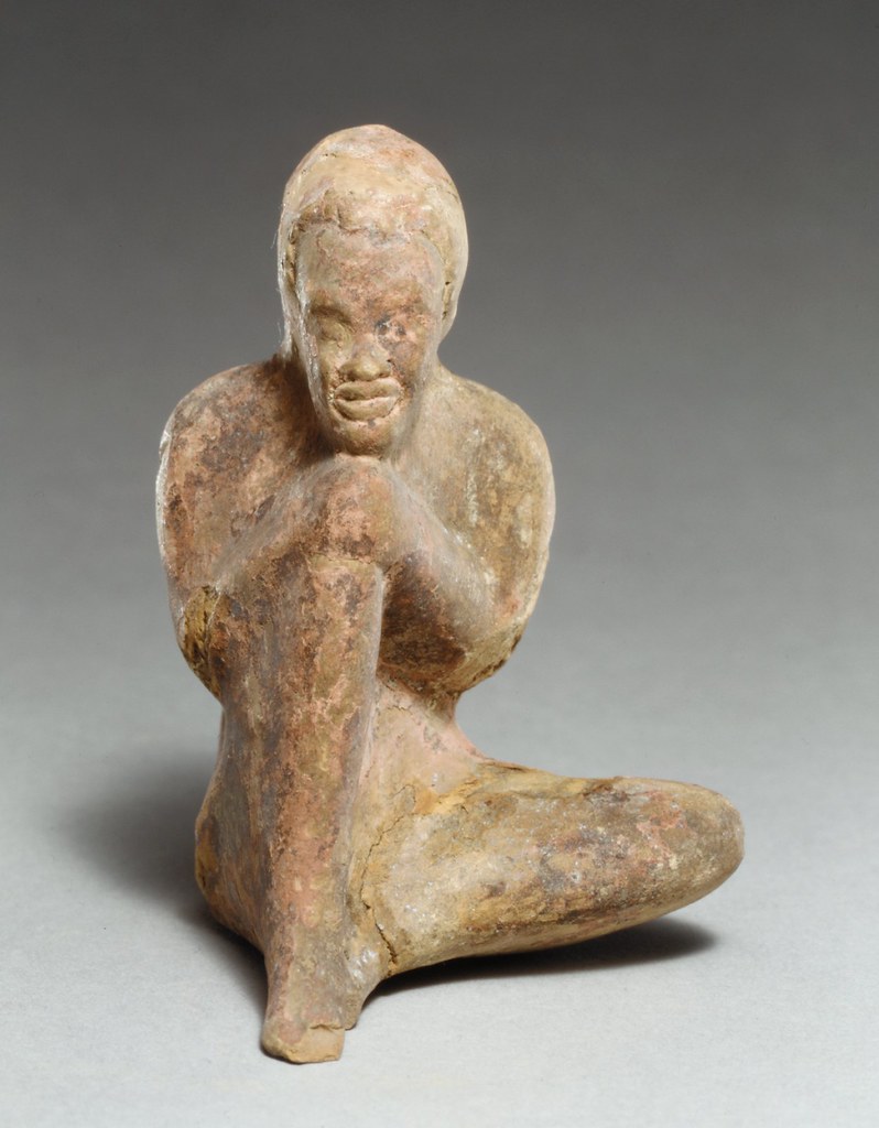 Rhodian moldmade terracotta figurine of a seated boy, 2 Flickr