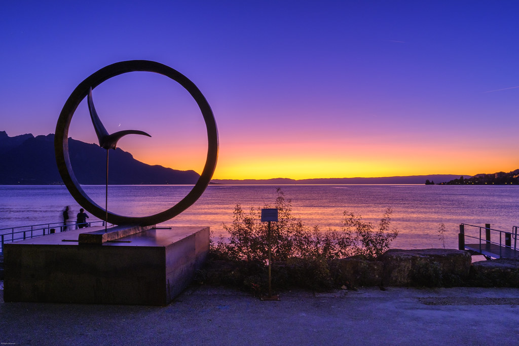 Sunset statute at boardwalk Lake Geneva, Swiss DSCH9905 Flickr