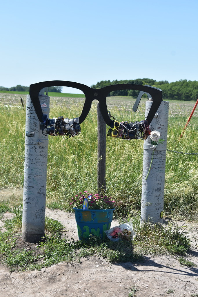 BUDDY HOLLY CRASH SITE GLASSES The giant Buddy Holly glass… Flickr