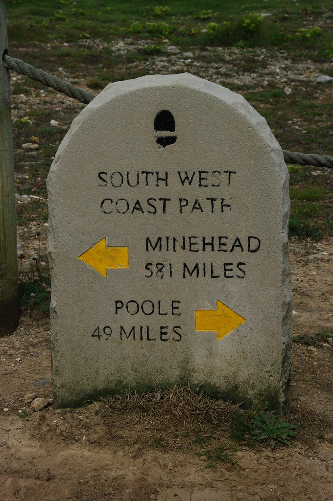 Milestone On the southwest coast path which connects Poole… Flickr