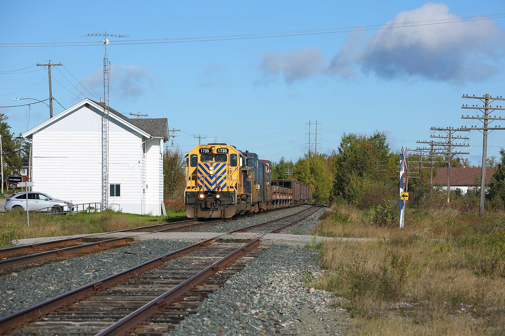 Val Gagne Ditcher 1 travels southbound through the small … Flickr