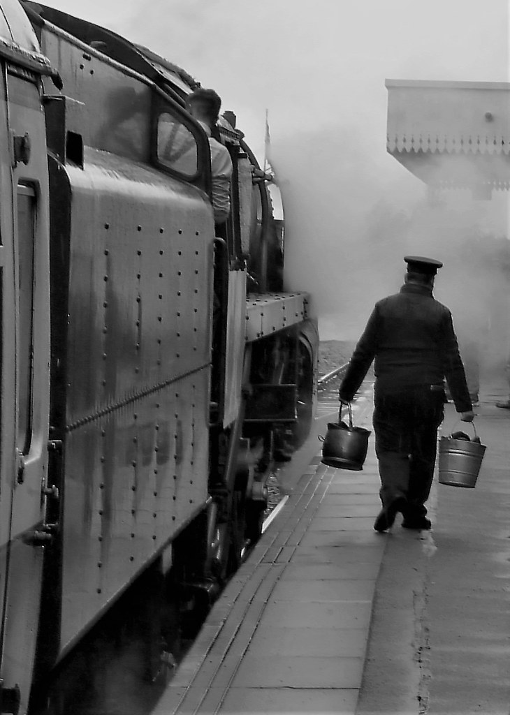 coal buckets A porter sources fuel for the station fire at… Flickr