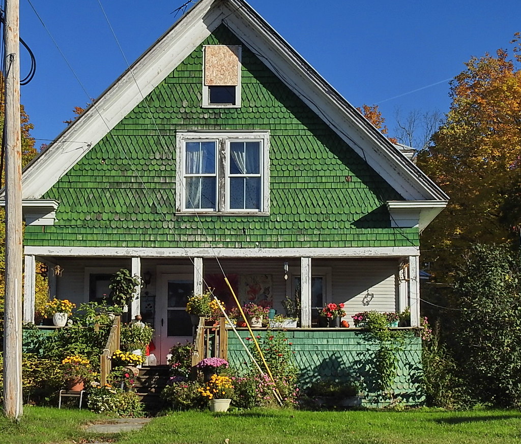 This Cute Little Old House Still holding out at a busy int… Flickr