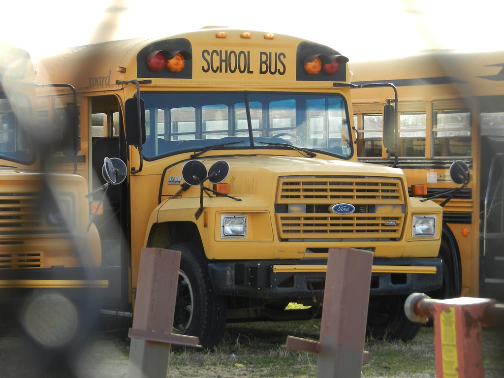Gosnell Public Schools 3818 (2) Bus lot Gosnell, AR. Flickr