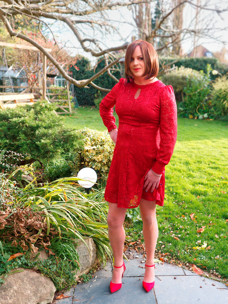 Outside in a little red lacy dress in winter… Flickr