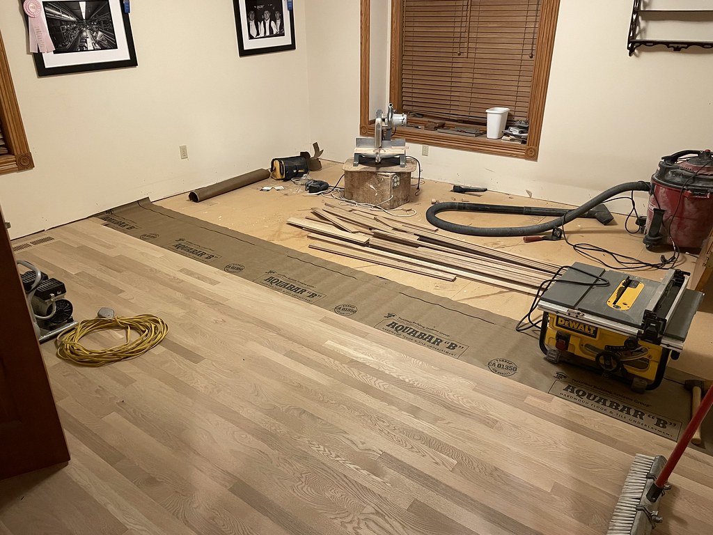 IMG_1386 Changing out 30 year old carpeting for oak floors… Flickr