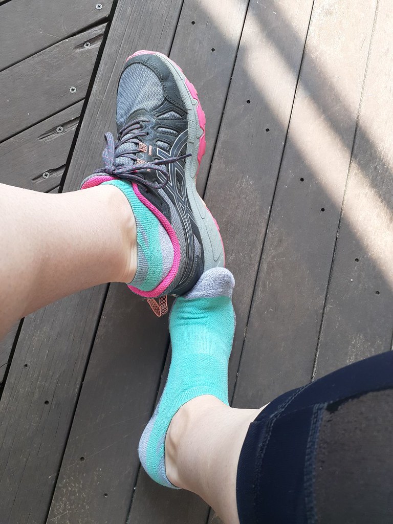 Taking off shoes and socks to show red toes Arch Goddess Flickr