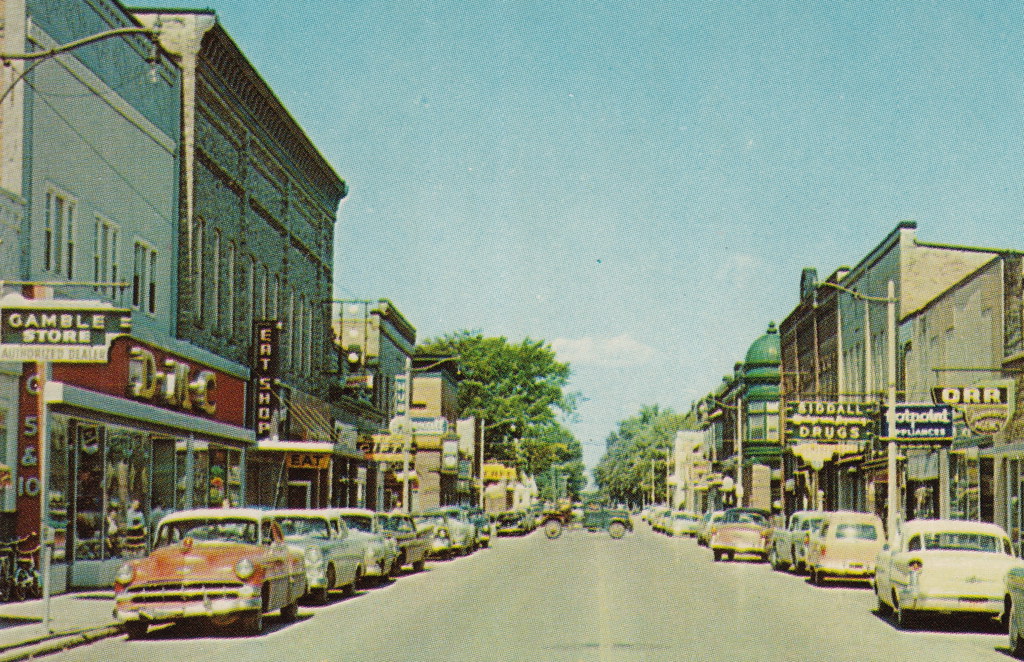 UP Manistique MI 1950s GREAT 50s CARS Downtown Stores and … Flickr