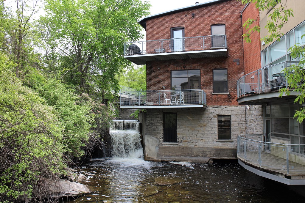 Pretty Waterfall next to Apartment Building, Riverwalk, Mi… Flickr