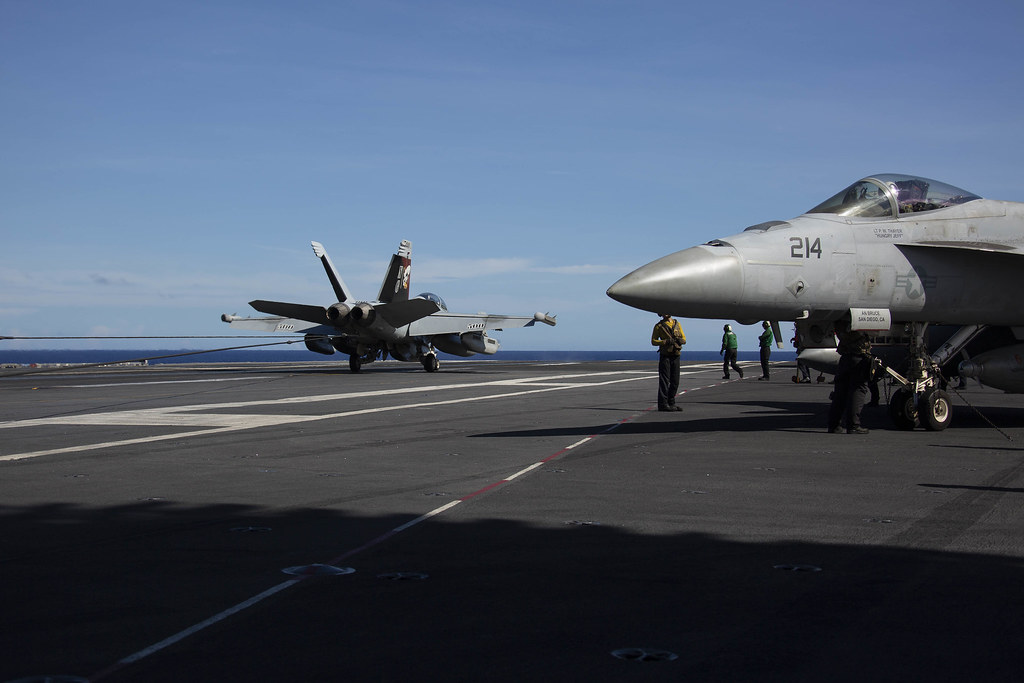 An EA18G Growler makes an arrested landing on USS Abraham… Flickr