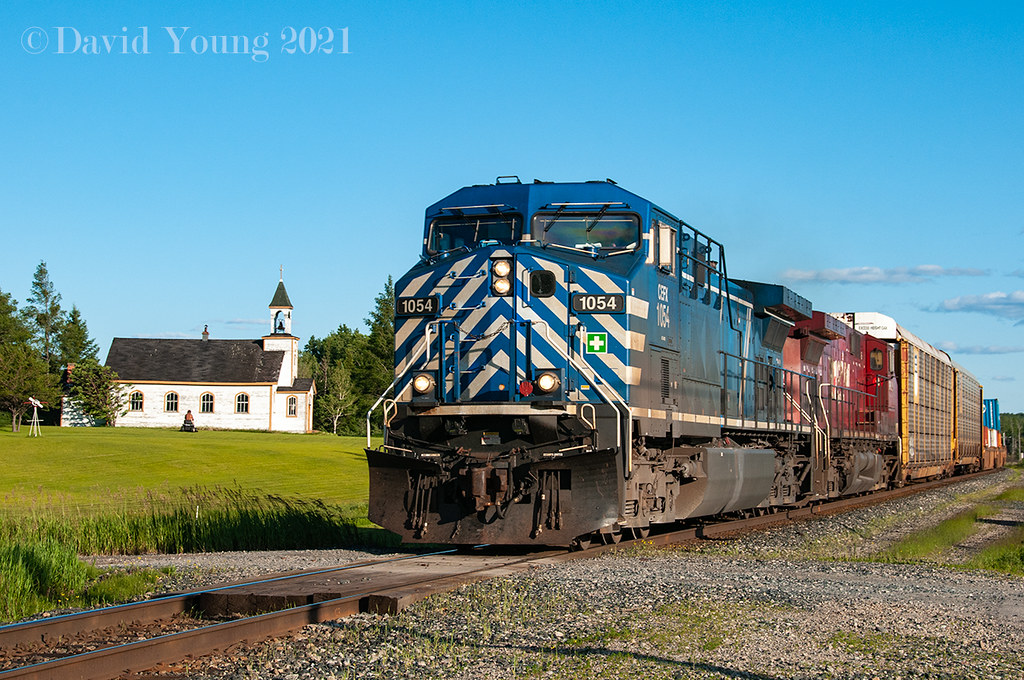 Upsala Church CEFX 1054 and CP 9554 lead train 10310 past… Flickr