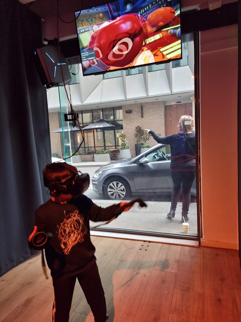 Liam playing virtual reality games at Viri VR Alpha Flickr