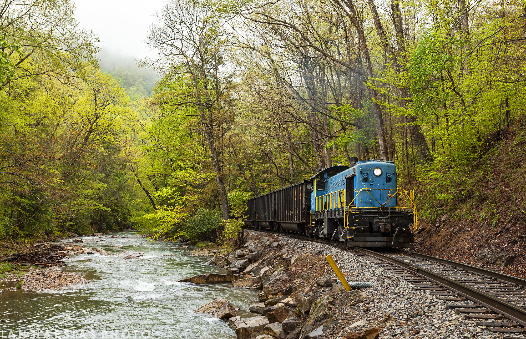 West Virginia looks nice. ALCO S4 115 takes another train of empty coal