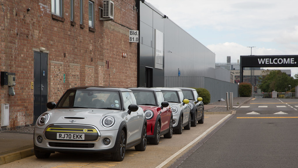 Minis at the Cowley Works Spot the charging point! Flickr