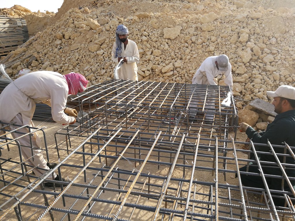 Pakistani iron and steel beams construction workers on a b… Flickr
