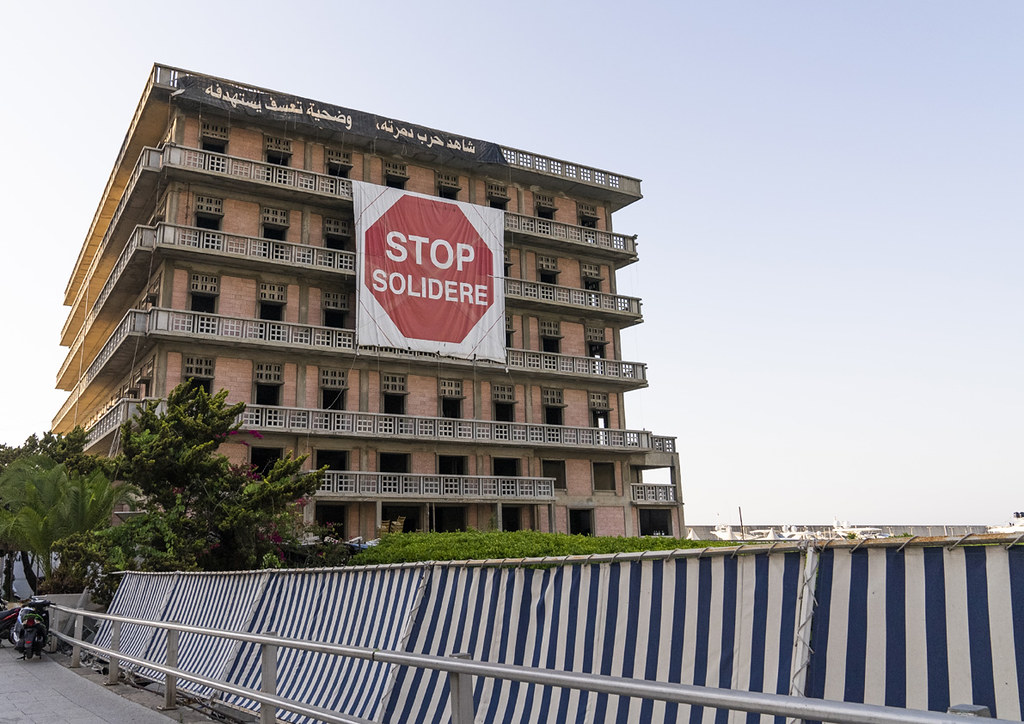 Sign at the abandonned St hotel protesting against … Flickr