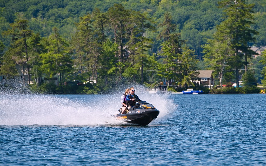 Two people on a jet ski From a boat in Lake Winnipesaukee,… Flickr