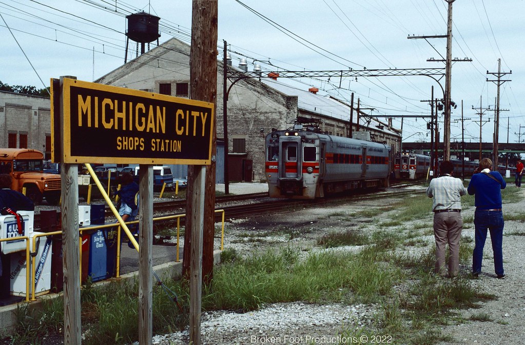 South Shore NWI trip station sign and arriving train Michi… Flickr