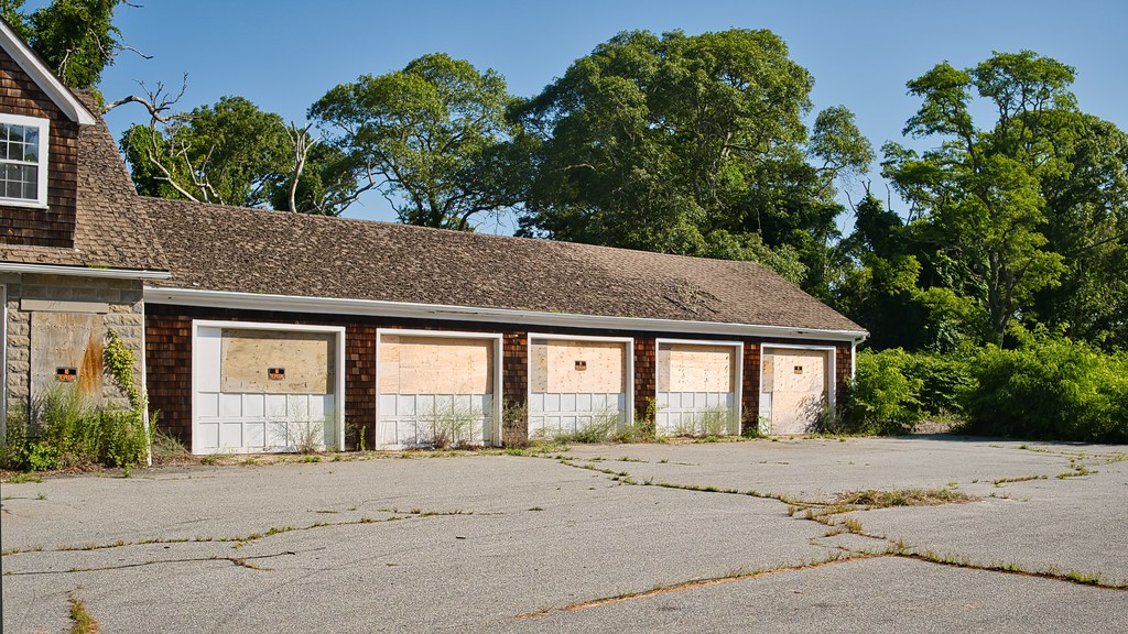 Boarded up garages at Falmouth Water Division building Flickr