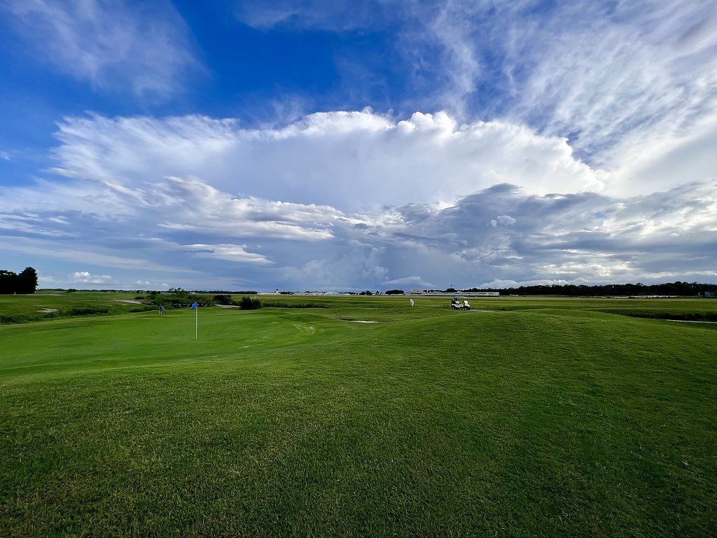 Blue Sky Golf Wideangle view of an August thunderstorm fr… Flickr