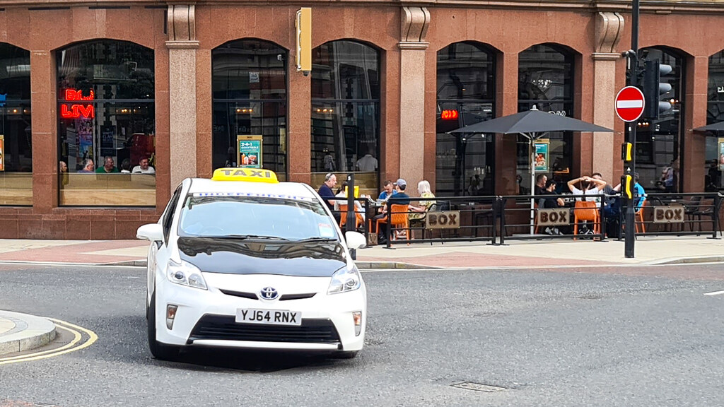 Leeds Black and White Taxi A black and white metered taxi … Flickr