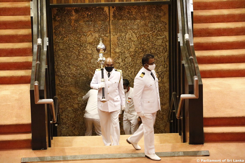 The SerjeantatArms carrying the Mace. Pix by DumindaUGN Flickr