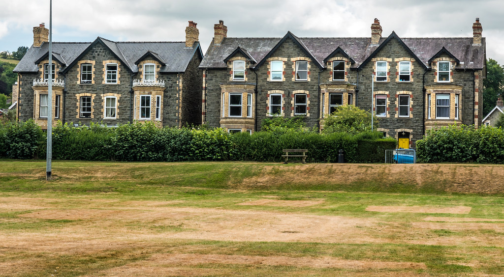 houses beside The Groe (park) in Builth Wells, Wales Flickr