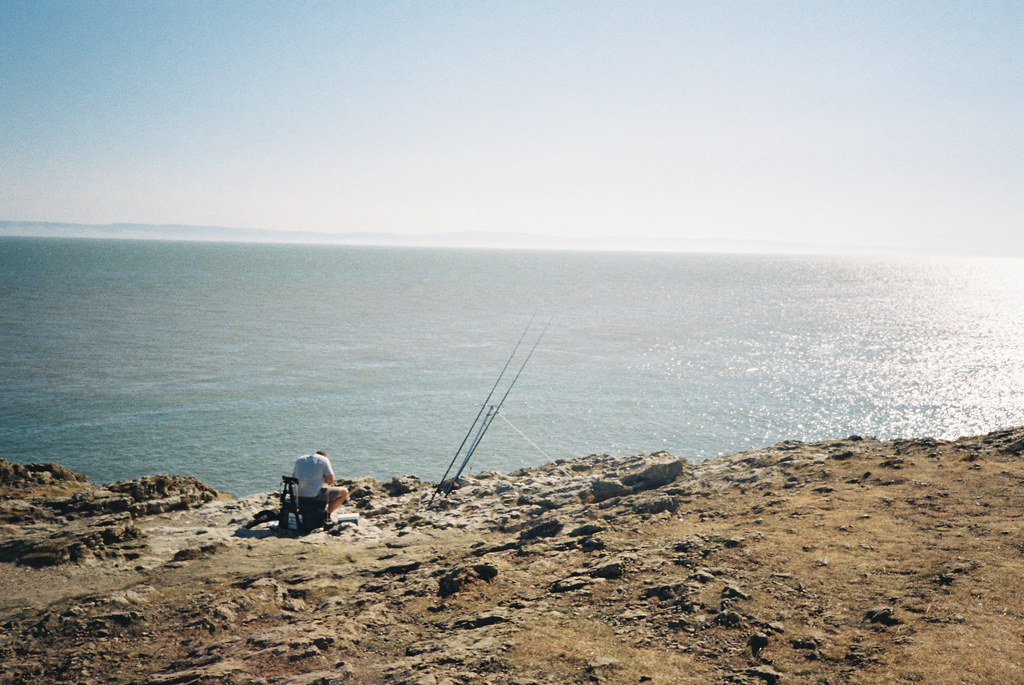 fisherman at friars point, barry island shot on olympus xa… Flickr
