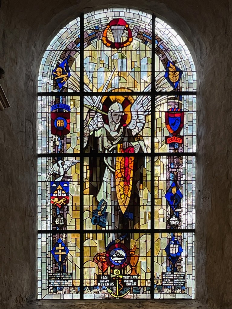Stained glass window of St. Michael, SainteMereEglise Flickr