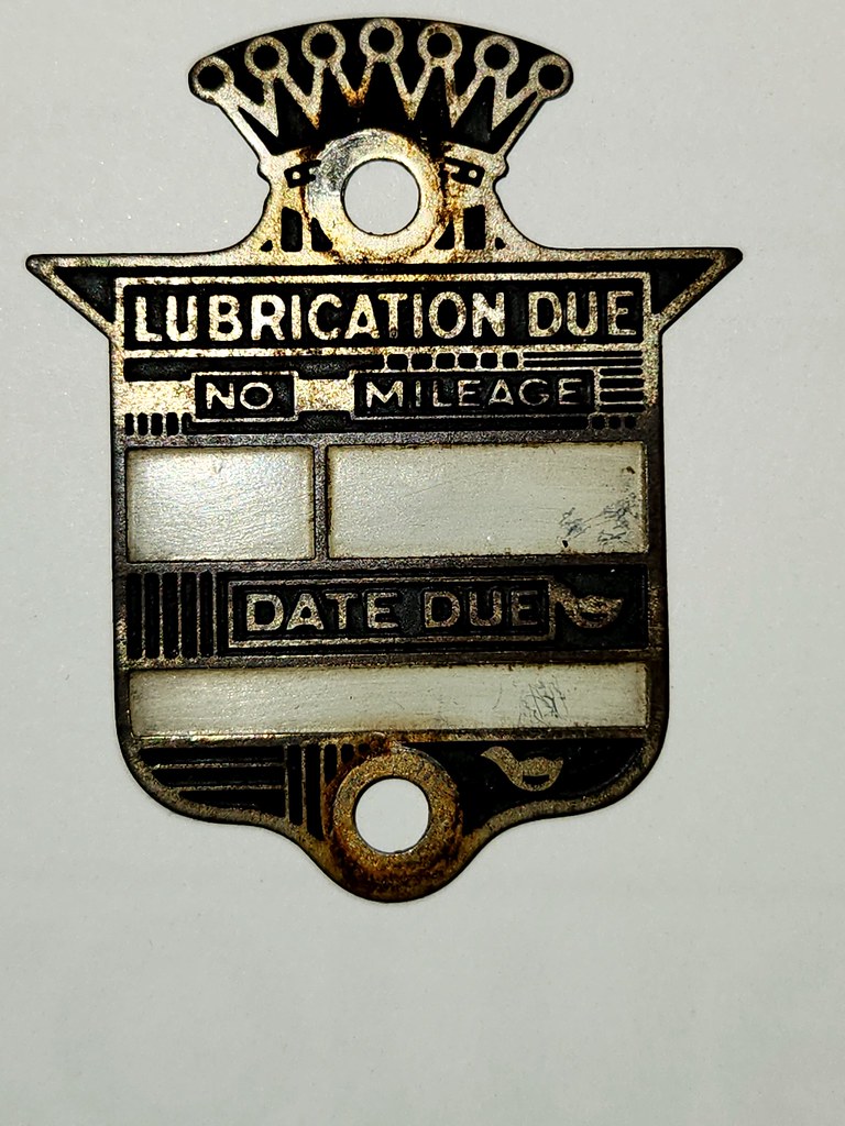 Cadillac LaSalle oil change reminder tag From a 1940 LaSal… Flickr